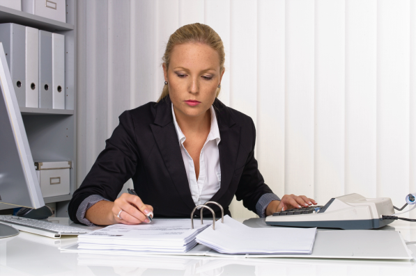 CEO reviewing customer deductions manually